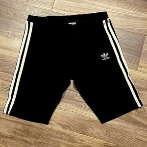 Adidas womens biker shorts size M color black with white stripes down the side